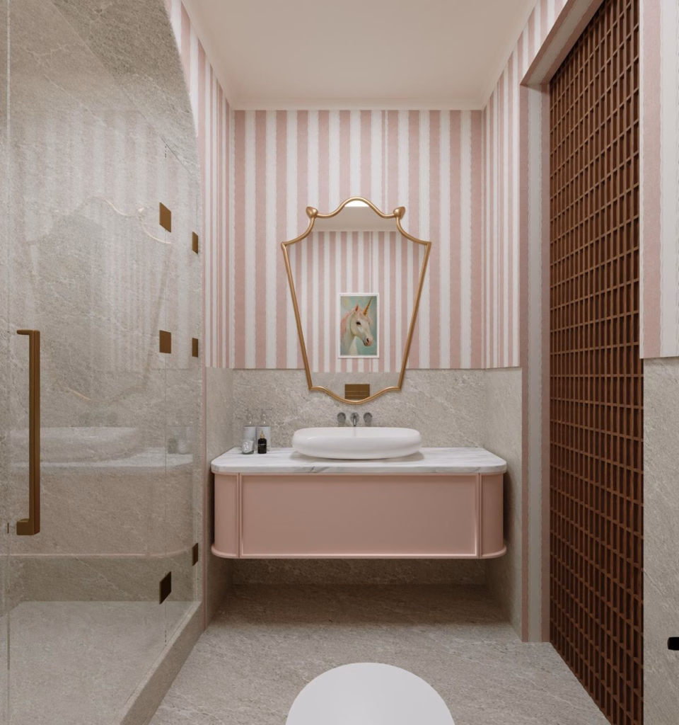 3D render of the girl's en-suite in Villa Zayed featuring pink vertical striped walls, a floating pastel pink vanity, and a scalloped gold mirror.